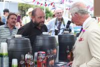 Prince Charles inspecting a local brew